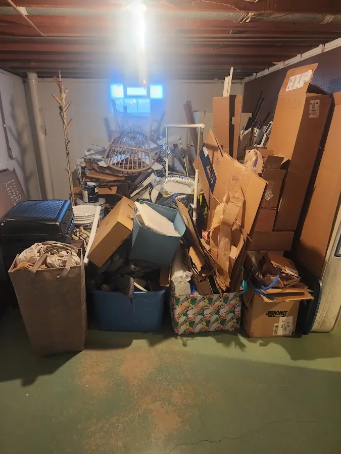 Roll-off dumpster container at job site for 2 Yard Dumpster Rental in Channelview